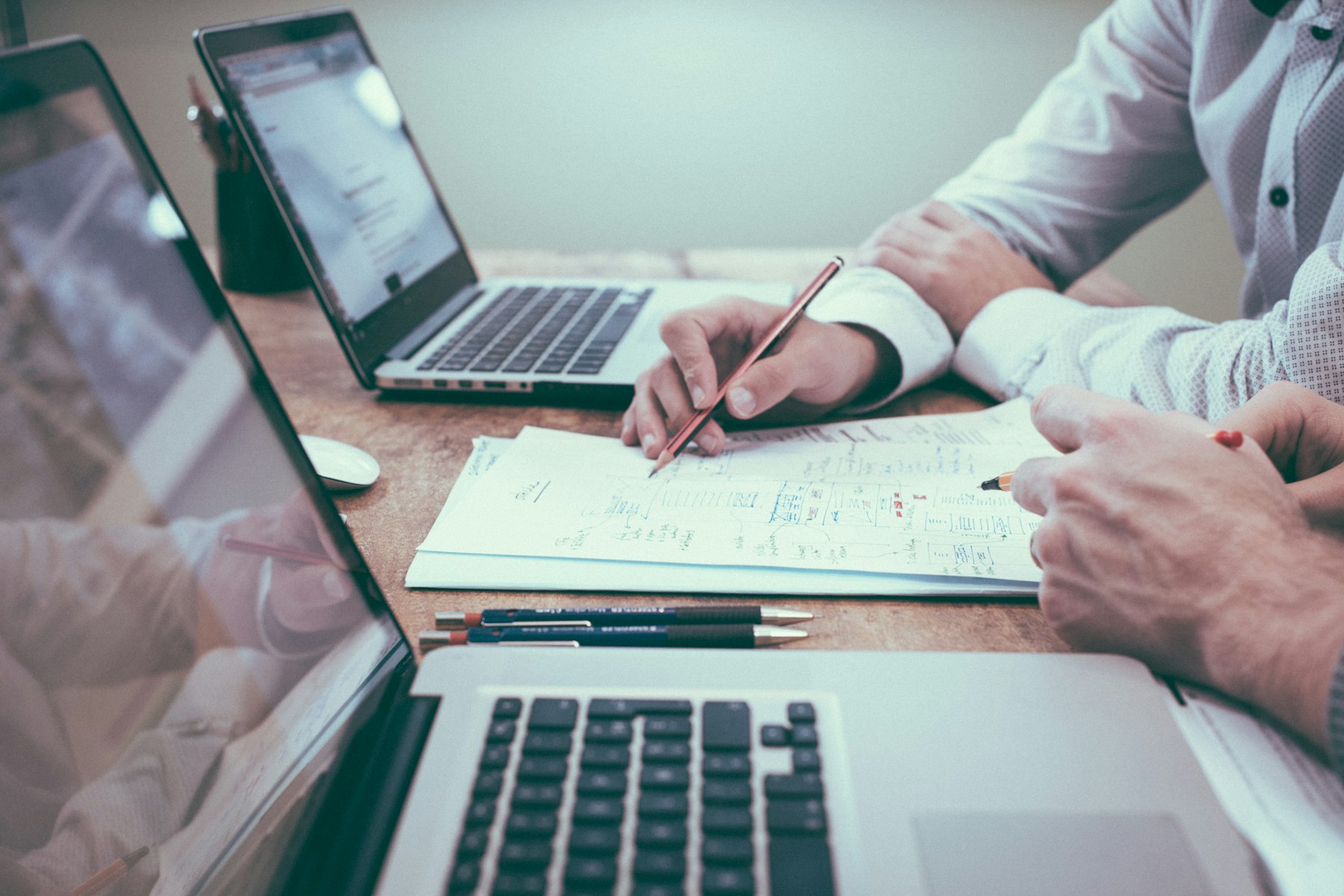 Property documents and analysis on a desk