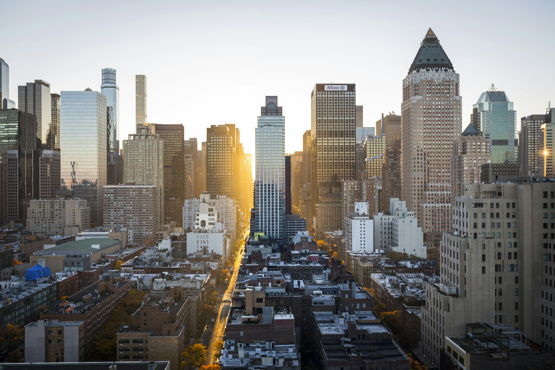 Urban mixed-use buildings in a city neighbourhood at dusk